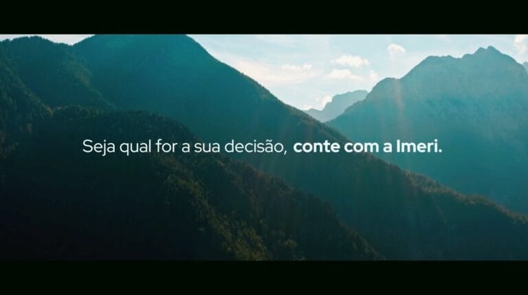 Montanhas ao amanhecer com texto motivacional: Seja qual for a sua decisão, conte com a Imeri.